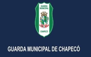 Emblema institucional da Guarda Municipal de Chapecó sobre fundo azul